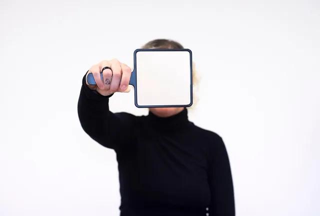face, mirror, woman, blank, reflect, isolated, white background, marketing. Influencer attribution methods: how to compare them on one campaign