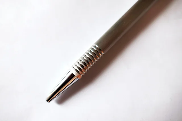 ballpoint pen, write, writing implement, writing tool, schreiber, stationery, office accessories, metal, signature, black, news, marker pen, ballpoint pen ink, paper. Influencer agencies vendor due diligence: UK checklist